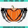 Pumpkin In Skeleton Hands